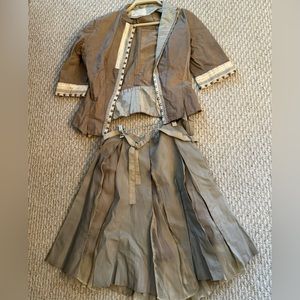 Leather jacket and skirt ensemble